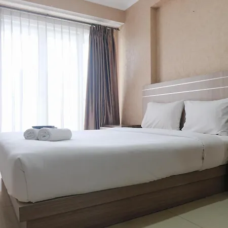 Homey Studio Apartment At Gateway Pasteur By Travelio
